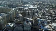 "Ни школ, ни садов, ни больниц". Как Алматы застраивают человейниками