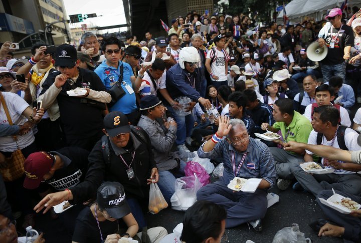 Protest leader Suthep Thaugsuban with his followers. ©Reuters