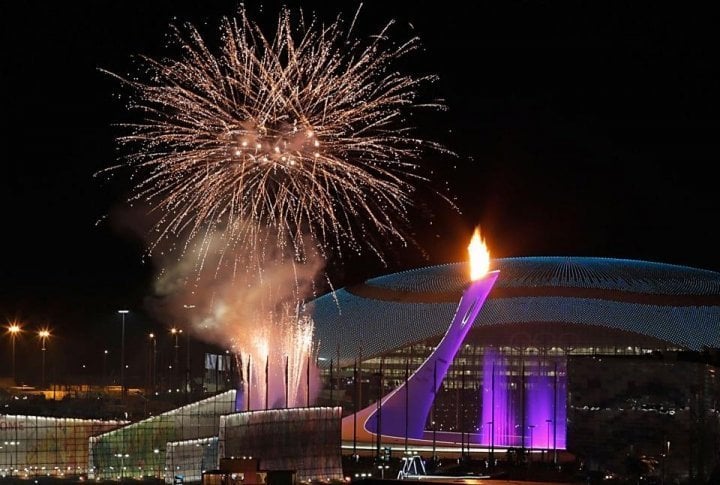 The Olympic flame is lit at the end of the Opening Ceremony of the 2014 Sochi Winter Olympics. ©sochi2014.com