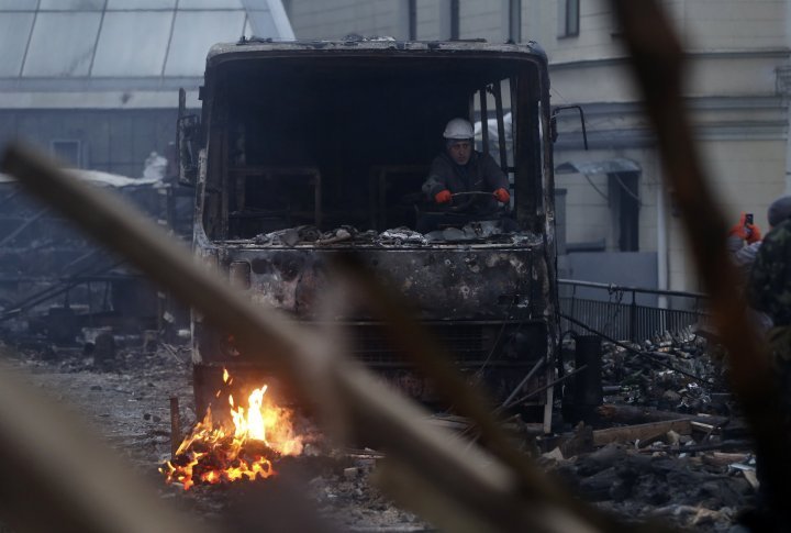 Burnt down police bus. ©Reuters