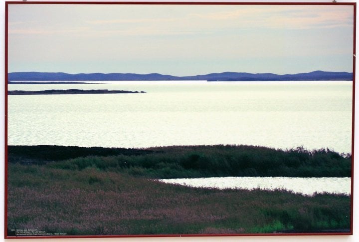 Lake Balkhash. Karaganda Oblast, in central Kazakhstan.

Lake Balkhash is one of the largest lake in Asia and 13th largest continental lake in the world. 

Uniqueness of lake Balkhash is that it has different mineralization on its western and eastern parts divided by a narrow strait. Western basin is almost fresh, eastern part of lake is salty.