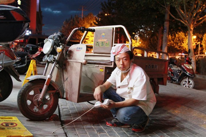 The locals prefer using electric mopeds. They can be recharged at any store by asking an extension cord. ©Vladimir Prokopenko