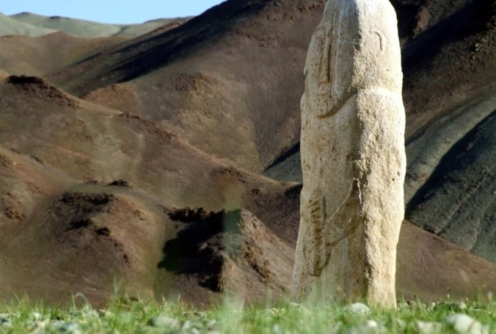 Balbal-tas. The rock resembles a man holding torsyk, a jar for kumys (mare's milk). ©Rustem Rakhimzhan