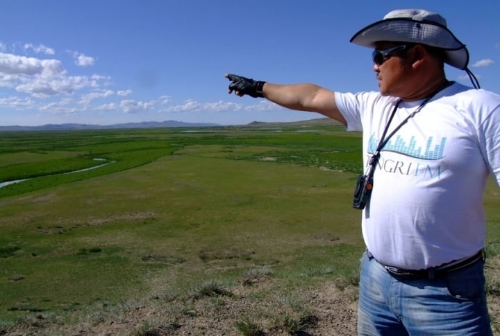 Rustem Abdrashov pointing the way to Karakorum, Genghiz Khan's capital. ©Rustem Rakhimzhan