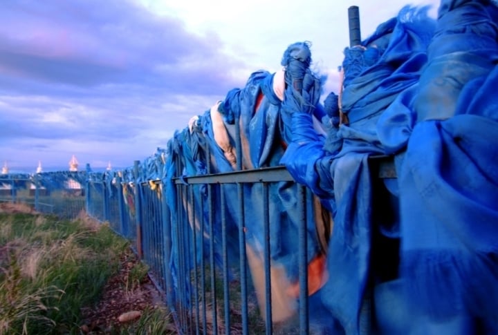 There are many sacred places in Mongolia. Blue stripes tied by pilgrims can be seen from far away. ©Rustem Rakhimzhan