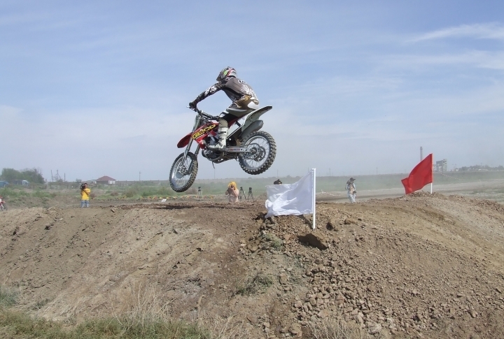 Bikers’ tournament on dusty hills. ©Roza Yessenkulova 