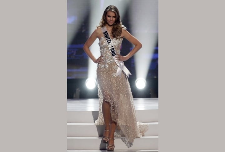 Miss Switzerland 2011 Kerstin Cook presents her evening gown during the Miss Universe preliminary competition in Sao Paulo September 8, 2011. The contestants are in Sao Paulo for the 2011 Miss Universe pageant which will be held on September 12. ©REUTERS/Nacho Doce