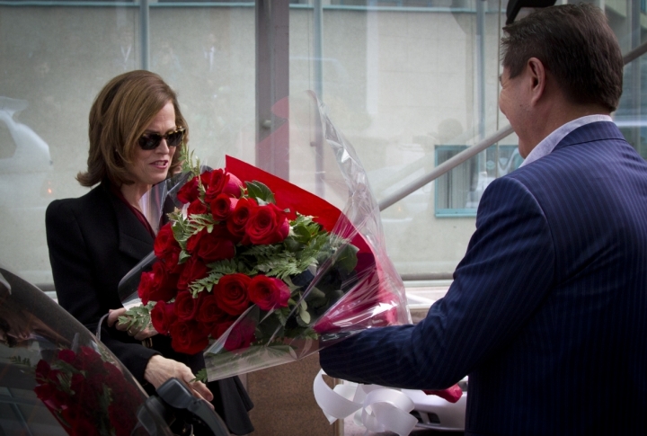 President of Kazakhfilm studio Yermek Amanshayev met Sigourney Weaver with a big bunch of flowers. <br>Photo by Vladimir Dmitriyev©