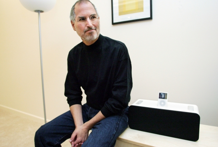 Apple CEO Steve Jobs sits next to the new Apple iPod Hi-Fi which he introduced at an event for press and industry analysts at Apple headquarters in Cupertino, California, February 28, 2006.  
<br>©REUTERS/Lou Dematteis