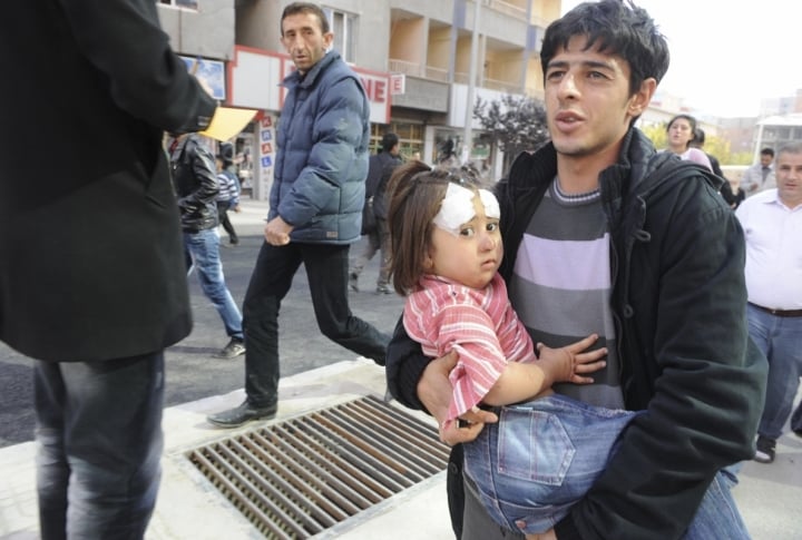 A kid was found under a collapsed building. ©Reuters/Stringer Turkey