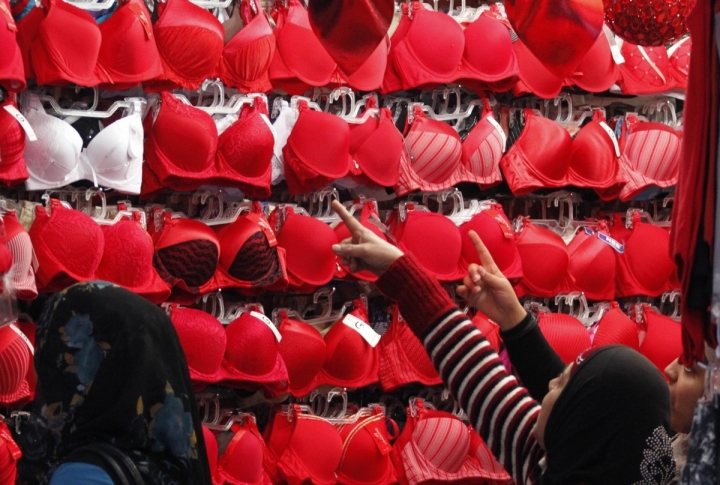 Muslim women shop for lingerie for sale ahead of Valentines Day at the port city of Sidon, southern Lebanon. ©REUTERS/Ali Hashisho