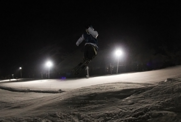 New School skier twisting 180 degrees with the grab. Photo by Vladimir Prokopenko©