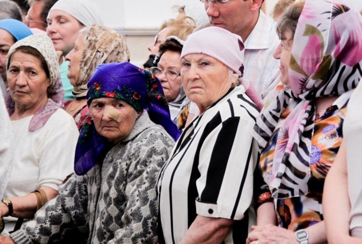 Christians gathered for a prayer. Photo by Danial Okassov©