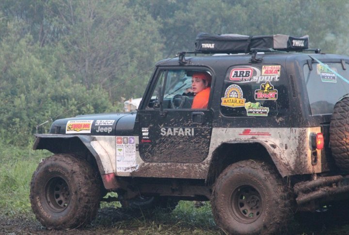 Only the most experienced offroaders managed to overcome the mud and deep ruts on their way uphill and cross the river. Photo by Vladimir Prokopenko©