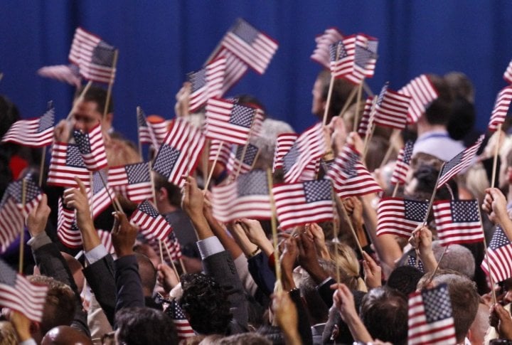 Supporters of U.S. President Barack Obama celebrate during his election night victory rally in Chicago. ©REUTERS/Jim Bourg