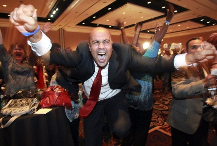 Ajay Narayan cheers as the race is called for U.S. President Barack Obama by a television network during the Nevada State Democrats' election night party at the Mandalay Bay Resort in Las Vegas. ©REUTERS/Sam Morris