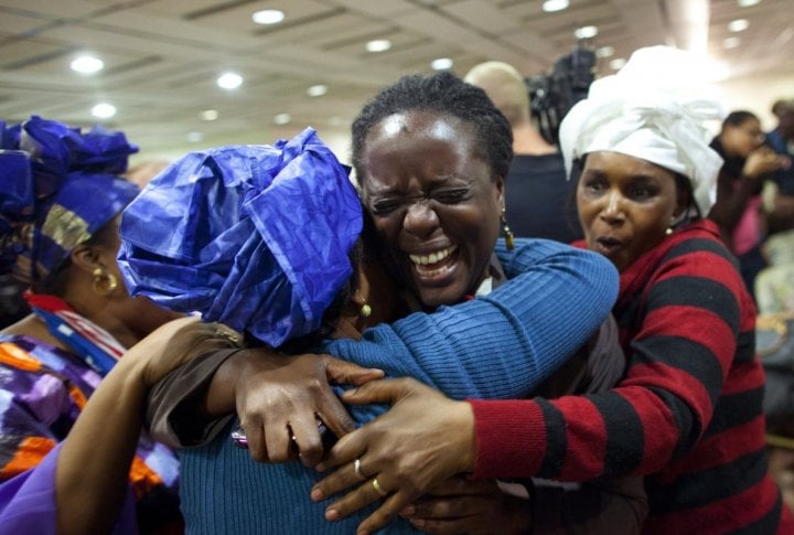 People celebrate as they watch election results broadcast confirming the re-election of President Barack Obama at Melba's 25 at the Harlem State Office building in New York. ©REUTERS/Andrew Kelly