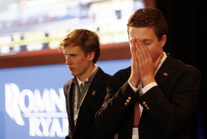 Supporters react while watching results during Republican presidential nominee Mitt Romney's election night rally in Boston. ©REUTERS/ERIC THAYER