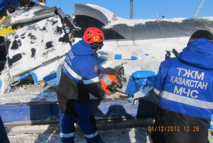 Emergency Situation Department's staff clearing the helicopter's fragments. Photo courtesy of press-service of Almaty oblast Emergency Situations Department©