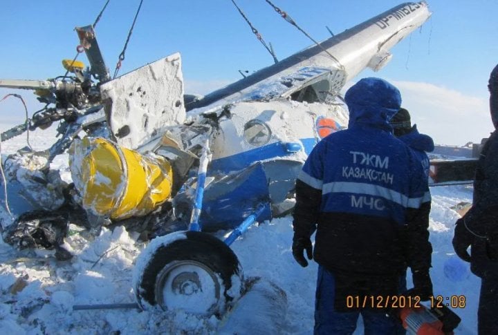 Emergency Situation Department's staff clearing the helicopter's fragments. Photo courtesy of press-service of Almaty oblast Emergency Situations Department©