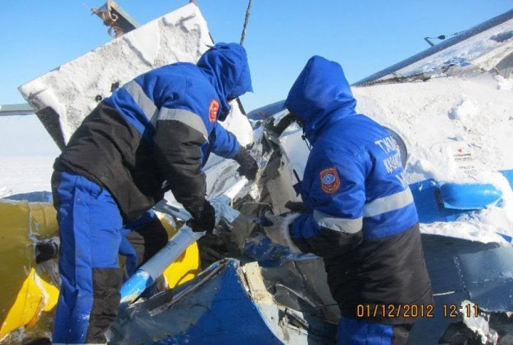 Emergency Situation Department's staff clearing the helicopter's fragments. Photo courtesy of press-service of Almaty oblast Emergency Situations Department©