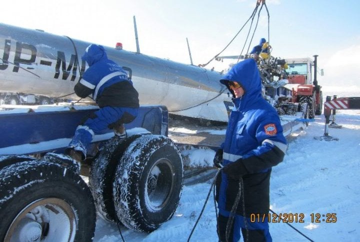 Emergency Situation Department's staff clearing the helicopter's fragments. Photo courtesy of press-service of Almaty oblast Emergency Situations Department©