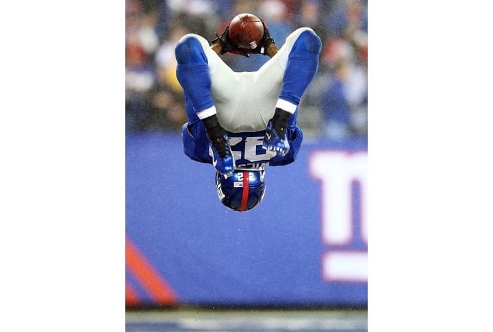 After having scored his third touchdown in the game against the Saints, running back David Wilson celebrated with a backflip. Photo courtesy of SI.com