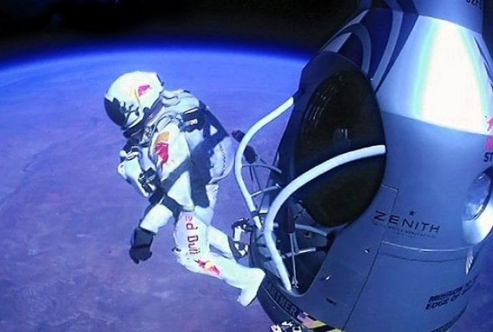 Austrian Felix Baumgartner jumps out of the capsule during the final manned flight for Red Bull Stratos on Oct. 14, 2012 in space. Photo courtesy of SI.com