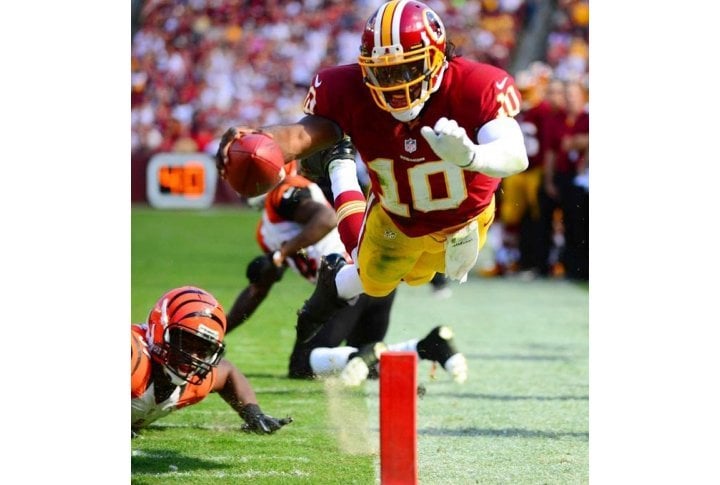 Washington Redskins quarterback Robert Griffin III stepped out of bounds shy of the goal line during the Redskins' loss to the Cincinnati Bengals. Photo courtesy of SI.com