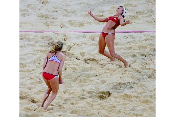 Misty May-Treanor and Kerri Walsh won their third consecutive gold medal in beach volleyball at the 2012 Summer Olympics. Photo courtesy of SI.com