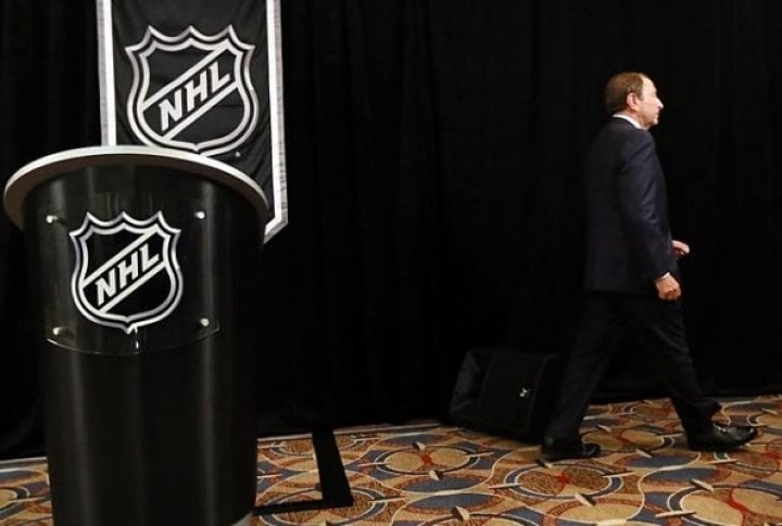 Commissioner Gary Bettman walks away from the podium after having announced that the league would lock out its players if a new labor deal was not reached. Photo courtesy of SI.com