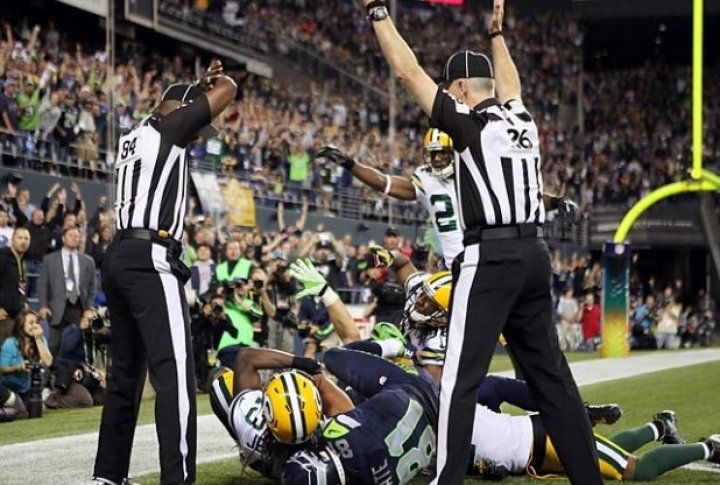 Referees making decision. Photo courtesy of SI.com