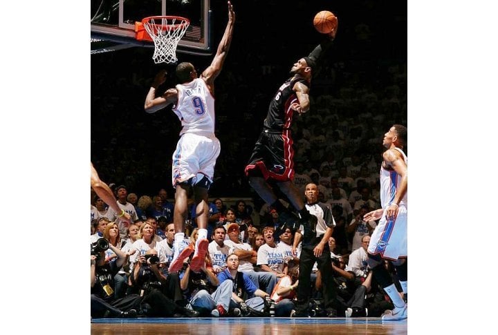 LeBron James goes up for a slam against the Thunder during the NBA Finals. Photo courtesy of SI.com