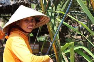 Vietnamese woman in Cu Chi. Photo by Roza Yessenkulova©