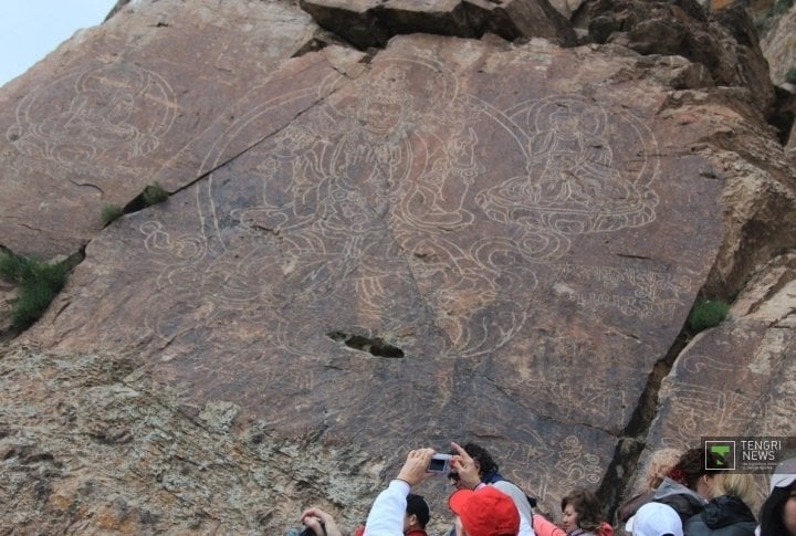 Buddha engraving on the rock. Photo by Vladimir Prokopenko©