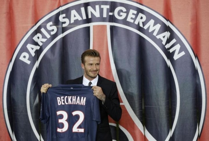 Soccer player David Beckham presents his new jersey after a news conference in Paris January 31, 2013. ©REUTERS/Philippe Wojazer