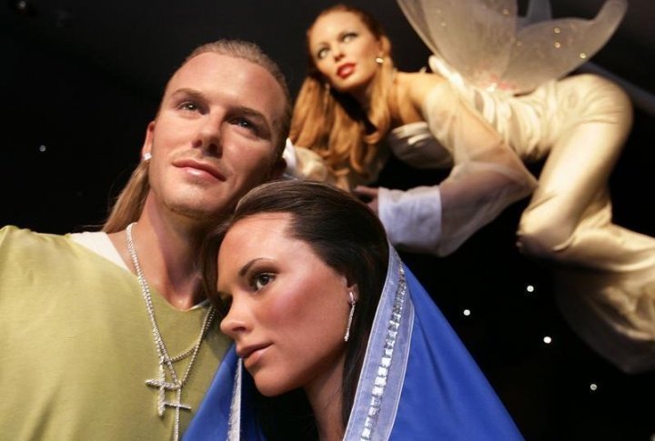 Wax works of England soccer captain David Beckham (L) and his wife Victoria appear as Joseph and Mary in a new celebrity nativity scene at Madame Tussauds London. ©REUTERS/Peter Macdiarmid PKM/MD