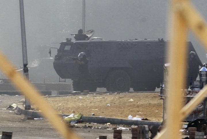 Riot police fire tear gas at members of the Muslim Brotherhood and supporters of deposed Egyptian President Mohamed Mursi during clashes. ©REUTERS