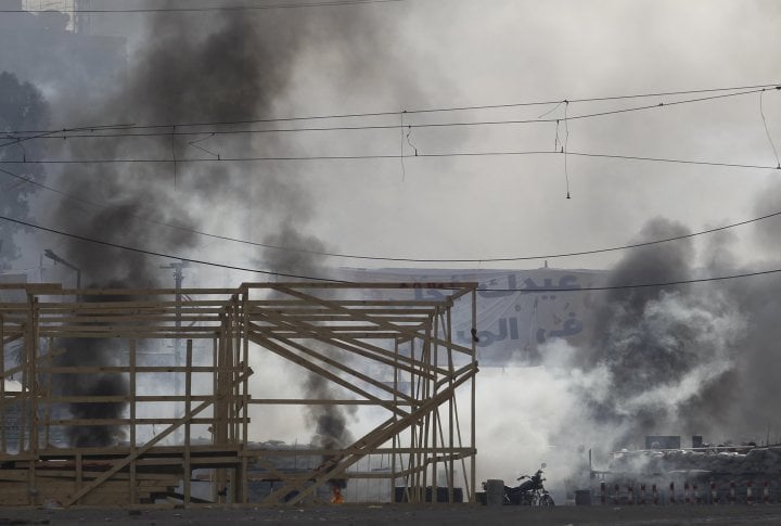 Smoke is seen as riot police clash with members of the Muslim Brotherhood and supporters of deposed Egyptian President Mohamed Mursi. ©REUTERS