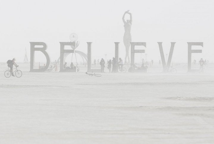 Dust envelops art installations during the Burning Man 2013 arts and music festival. ©REUTERS