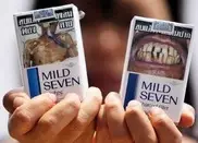 США отказались от "страшных" сигаретных пачек