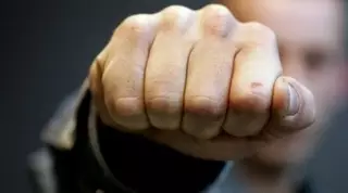 Украинский депутат из-за пиджака сломал челюсть коллеге