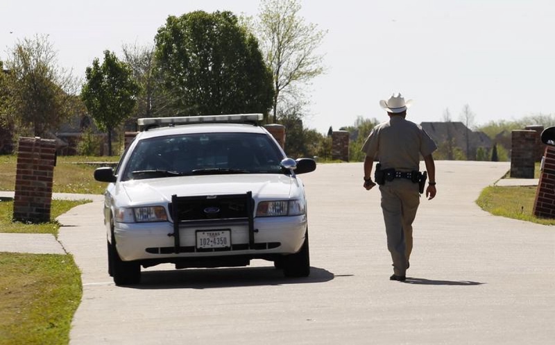 Полицейский в Техасе. Фото REUTERS/Tim Sharp©