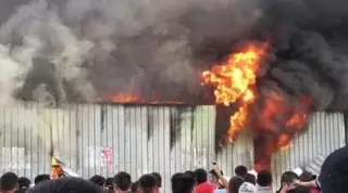 Два человека пострадали при пожаре на барахолке в Алматы