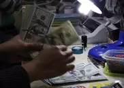 Курс доллара к тенге понизится из-за налоговых выплат