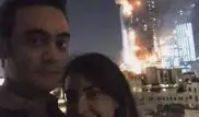 Пару раскритиковали за селфи на фоне горящего небоскреба в Дубаи