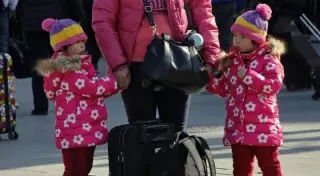 Китайцам в Пекине дали разрешение на третьего ребенка