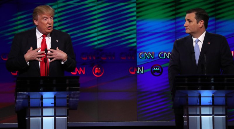 Дональд Трамп и Тед Круз. REUTERS/Carlo Allegri©