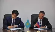 Бишимбаев подписал план действий по  увеличению товарооборота с Россией
