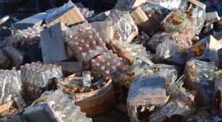 Две тысячи поддельных бутылок Dizzy Energy раздавили бульдозером в Алматинской области